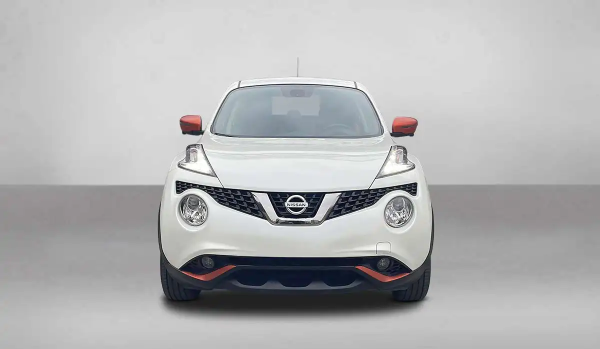 White Nissan Juke Nismo front on a soft studio backdrop